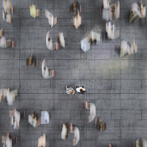 People in a crowd standing out