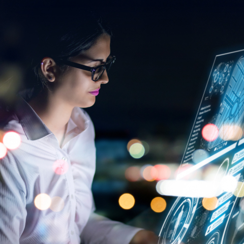 Woman in front of a desktop
